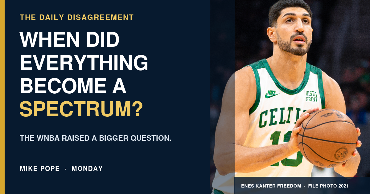 Enes Kanter Freedom holding a basketball beside the headline When Did Everything Become a Spectrum?